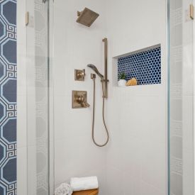 white-blue-bathroom-gold-shower-faucet